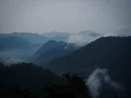 Fog on the mountains during the rainy season photo