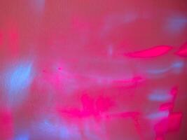 Reflected light, pastel pink and blue tones for a minimalist background. photo
