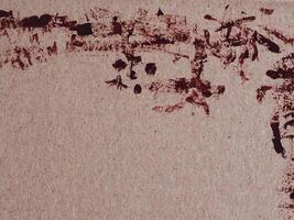 Paint on brown old paper for vintage background. photo