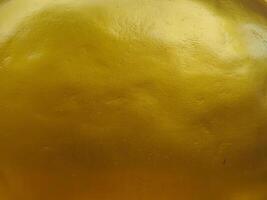 Golden texture at Buddhist temple, close-up for abstract background. photo