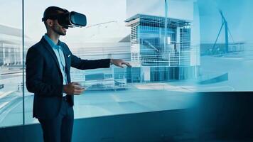A Male engineer controls a virtual reality headset. Exploring a 3D model of a construction project. video
