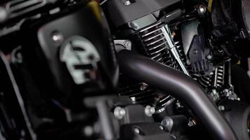 motorcycle engine in garage , Focus on the Cylinder block head ,close-up view. video
