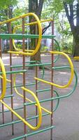 Yellow joyful climbing frame for child and kids in Japan playground photo