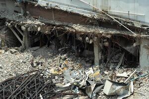 Top view of the destroyed building. Destruction of the building photo