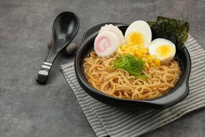 Ramen Noodles with egg and various topping photo