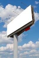 Billboard on pillar against the sky. Empty space for text. photo