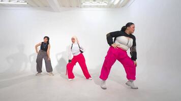 Dynamic Dance Performance in Minimalist Studio video