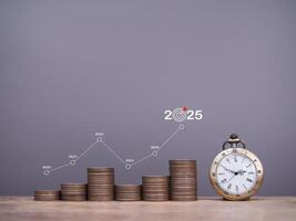 Vintage watch, Stack of coins with graph. The concept of business growth, Financial investment, Market stock, Profit return, Dividend and Business fund in year 2025 photo