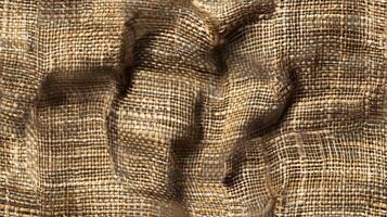 Hemp sack material. Hessian flax rough cloth. Fibrous beige rustic backdrop. Brown burlap knit texture. Natural fabric bag background. Vintage sackcloth pattern photo