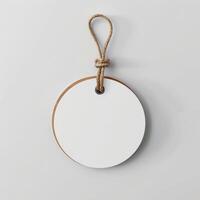 Fashion badge, white empty paper label. Mockup with copyspace. Luxury business blank tag photo