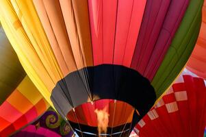 Colorful hot air balloons with igniting an inflatable photo