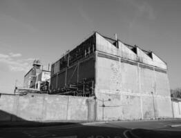 abandoned factory ruins in black and white photo