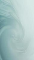 Vertical - Serene abstract background with swirling, ethereal waves in soft pastel green. Gentle fluid motion creates a sense of calm and tranquility and exudes a soothing and peaceful ambiance. video