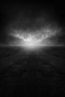Misty landscape at dawn with subtle light breaking through clouds photo
