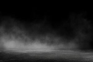 Mysterious fog envelops a dark, empty landscape at night photo