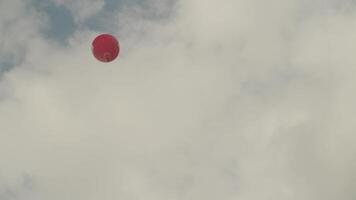Hot air balloons in Vang Vieng, Laos in the morning with a background of karst mountains video