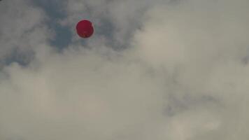 Hot air balloons in Vang Vieng, Laos in the morning with a background of karst mountains video