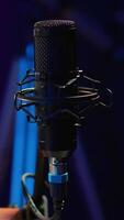 Vertical Empty home studio used to create music with electronic console and devices, pre amp knobs and soundboard with control panel. Space equipped with amplifier and tools, mixing and mastering. video