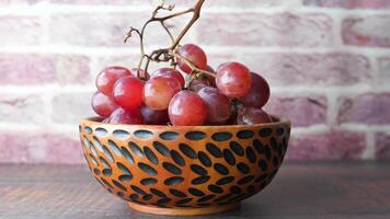 fresh grape fruit in a bowl , video