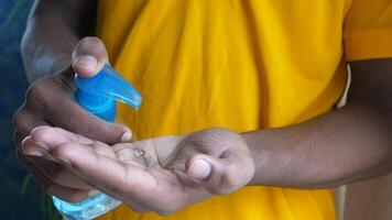 Using sanitizer liquid for preventing corona virus video