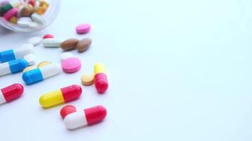 Close up of many colorful pills and capsules video