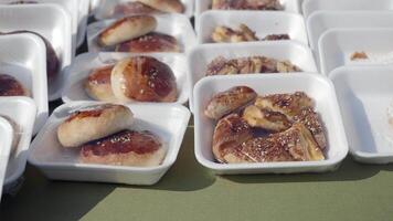 A beautiful assortment of delicious pastries is showcased on display at a local bakery event video