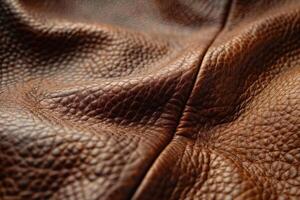 Close-Up of Rich Brown Leather Material Showcasing Texture and Detail photo