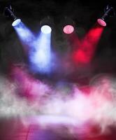 Empty Concert Stage With Colorful Spotlights and Smoke Effects photo