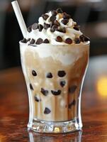 Delicious ice cream drink with whipped cream and chocolate chips photo