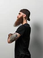 Confident Muslim Man With a Beautiful Beard Poses photo