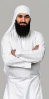 Muslim Man With a Beautiful Beard Posing in Traditional Attire photo