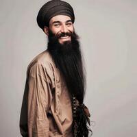 Smiling Muslim Man With a Long Beard in Traditional Attire photo