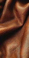 Textured Brown Leather Material Draped Elegantly for Crafting photo