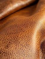 Close-Up of Brown Leather Material Showcasing Texture and Detail photo