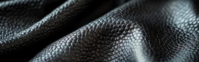 Black Leather Texture Displayed Elegantly in Soft Natural Light photo
