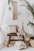 Cozy Boho Living Room With Natural Textiles and Greenery photo