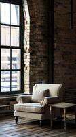 Cozy Armchair by Large Window in Industrial Loft Space photo