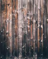 Rustic Wooden Wall With Textured Patterns and Shades of Brown photo