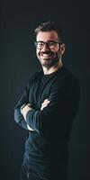 Smiling Male Executive in Minimalist Portrait Against Dark Background photo
