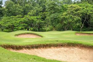 Sand pit in golf course. photo