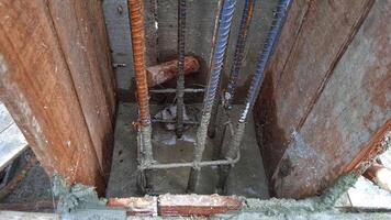 Concrete pouring during commercial concreting columns of buildings in construction photo