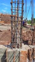 Concrete columns under construction in site photo