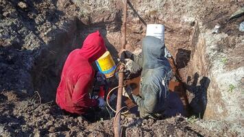 Construction work in the foundation pit photo