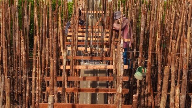 Wooden frame supporting the beam structure under construction. photo