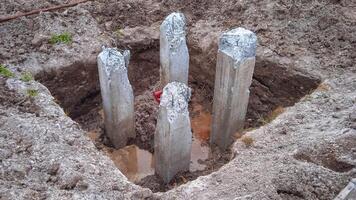 Concrete piles for building foundation photo