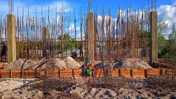Concrete columns under construction in site photo