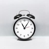 a clock on white background photo