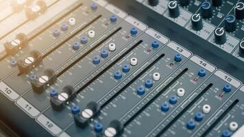 Close-up view of professional audio and sound equipment used for an event photo