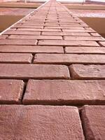 red bricks wall pattern texture background photo
