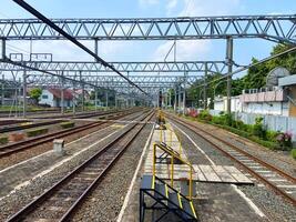 the train tracks are at the station photo